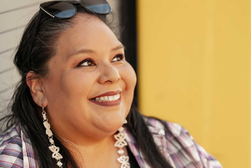A smiling Native American woman